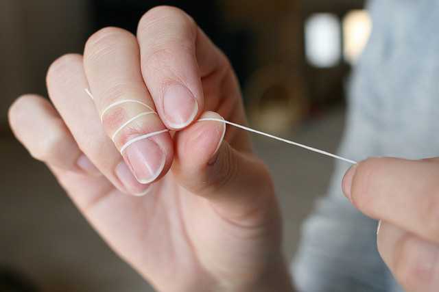 Come usare filo interdentale